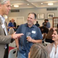 faculty gathered around